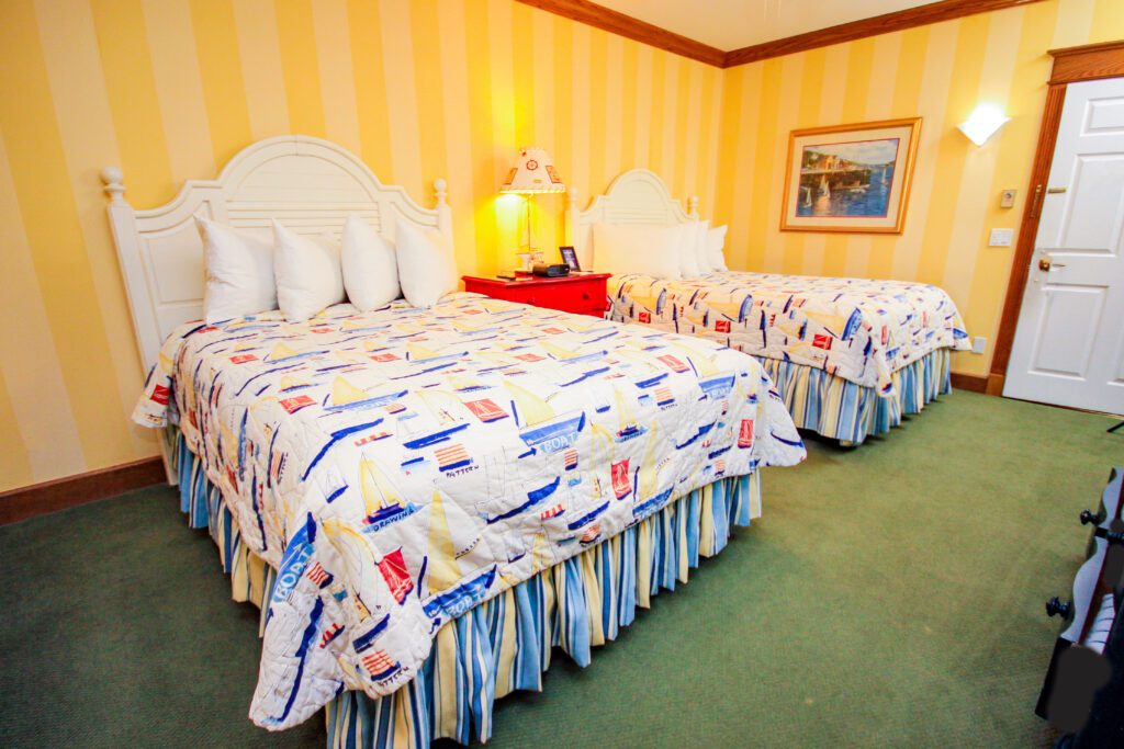 Harborview 2-Bedroom Suite with 3 Queen Beds Exterior picture of The Chippewa Hotel Waterfront on Mackinac Island with views of Main Street with bicycles and bikes