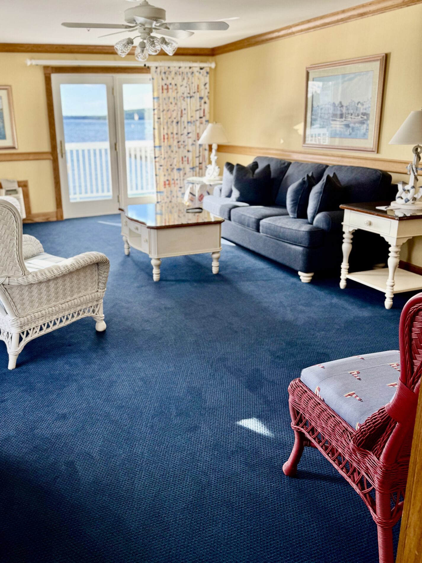 Chippewa Hotel Waterfront Corner Harborview Suite looking out towards the harbor and Lake Huron with a private balcony.