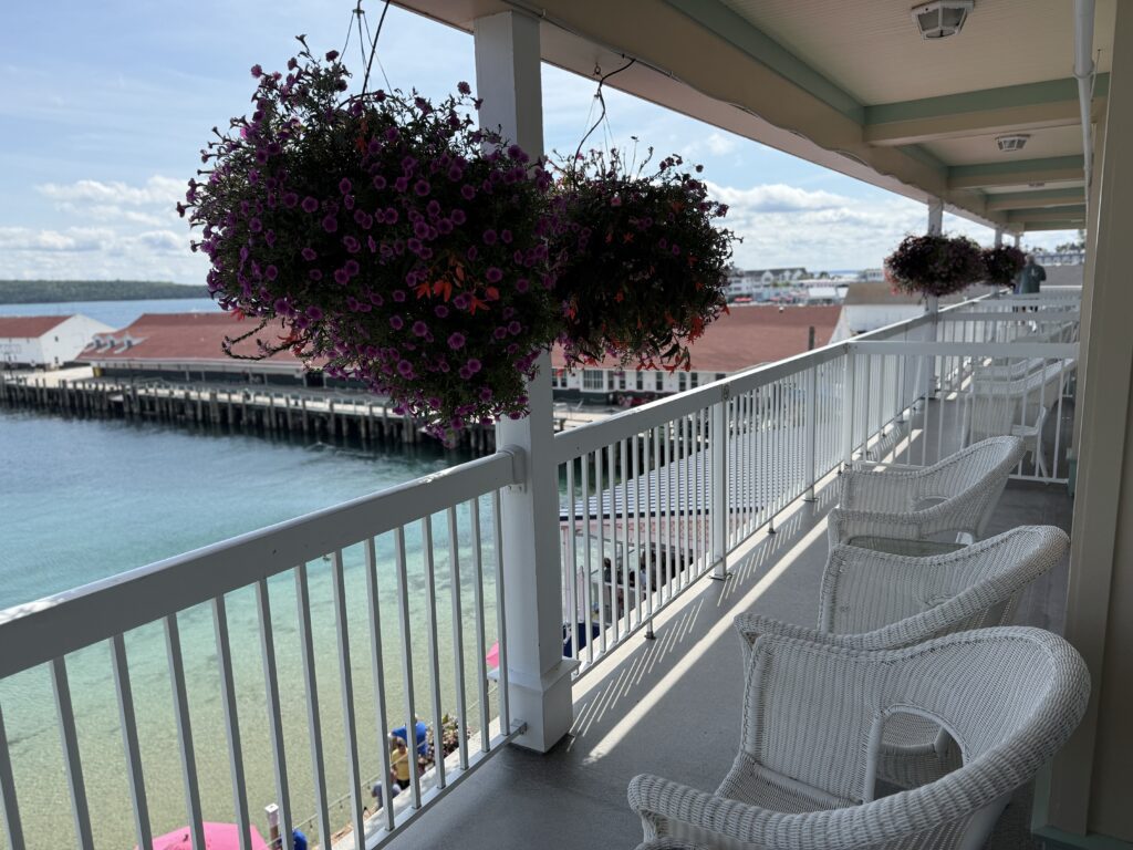 Balcony view at Chippewa Hotel Waterfront showing harbor, waterfront, and hotel exterior on Mackinac Island